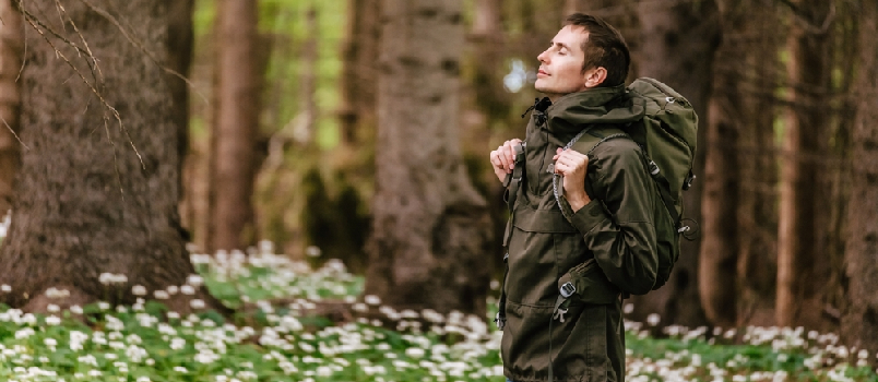 Hiker man enjoying the fresh air