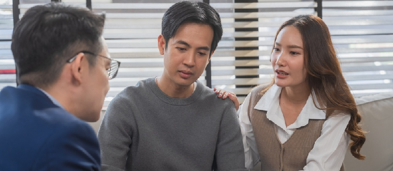 couple talking to therapist