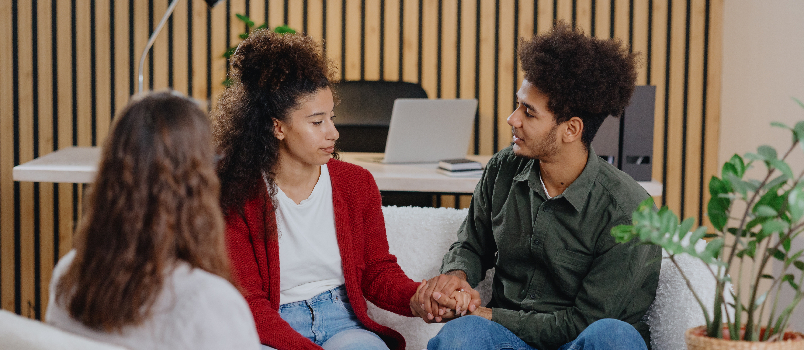 couple taking counselling session 
