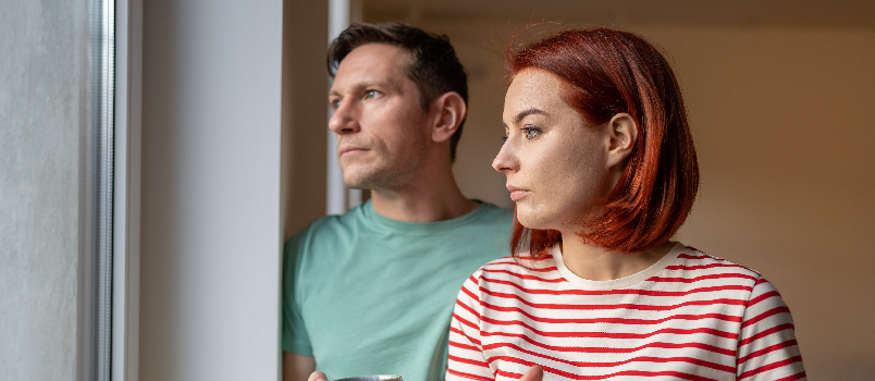 Couple Relaxing at Home with Hot Drinks
