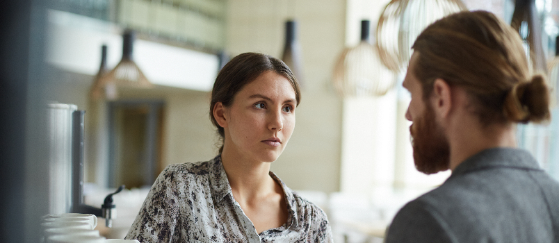 Business Discussion with Woman and Man in Cafe