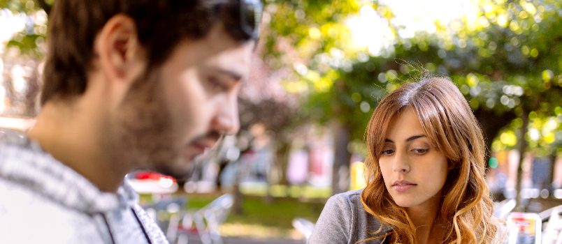 Young Man and Woman at Outdoor Cafe