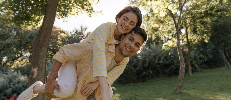 couple playing in park