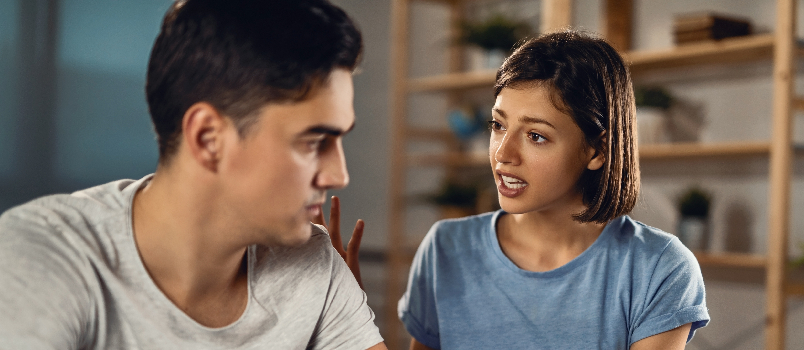 Frustrated Woman Arguing with Partner in Home