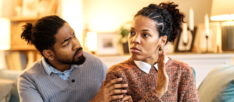 Upset Woman Rejecting Affection From a Man
