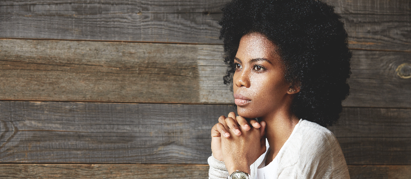 Thoughtful Woman with Coffee and Cake Indoors