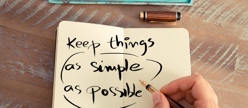 A Woman Hand Writing A Note With A Fountain Pen On A Notebook